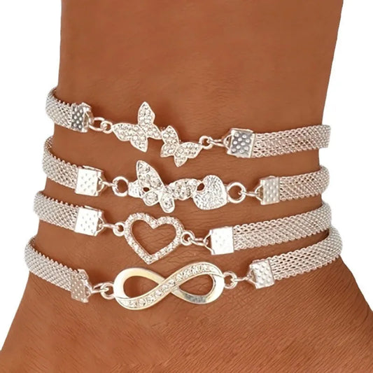 Silberfarbenes Fußkettchen mit Schmetterling, Herz, Unendlichkeitszeichen & Kreuz – Eleganter Sommerschmuck für Damen
