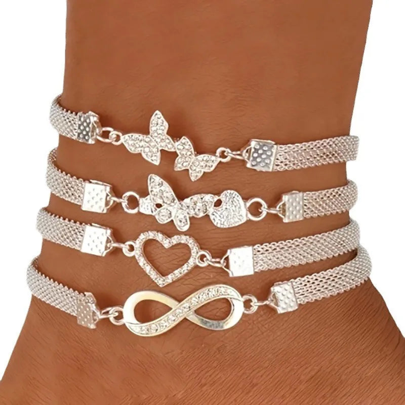 Silberfarbenes Fußkettchen mit Schmetterling, Herz, Unendlichkeitszeichen & Kreuz – Eleganter Sommerschmuck für Damen