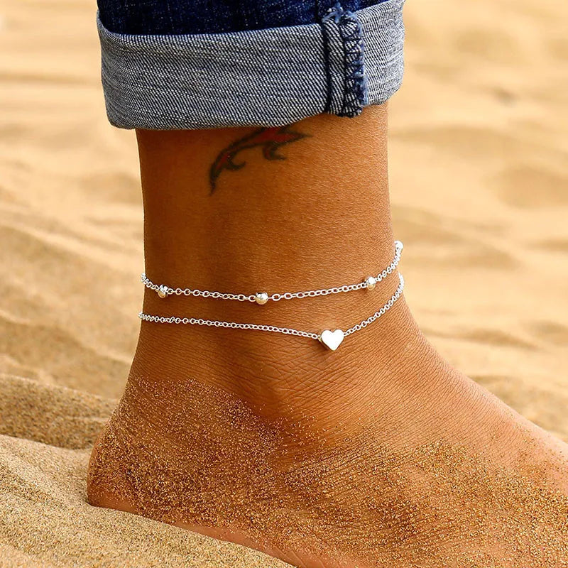 Silberfarbenes Fußkettchen mit Schmetterling, Herz, Unendlichkeitszeichen & Kreuz – Eleganter Sommerschmuck für Damen